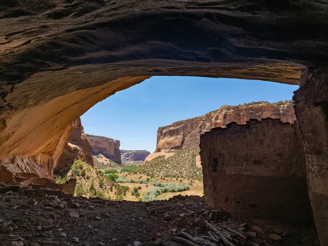 A view from one of Tse Yaa Kin’s caves opens onto the rich valley of Canyon del Muerto to the south, where the earth provided ideal conditions for cultivating corn, squash, beans, cotton and more throughout the past millennium.