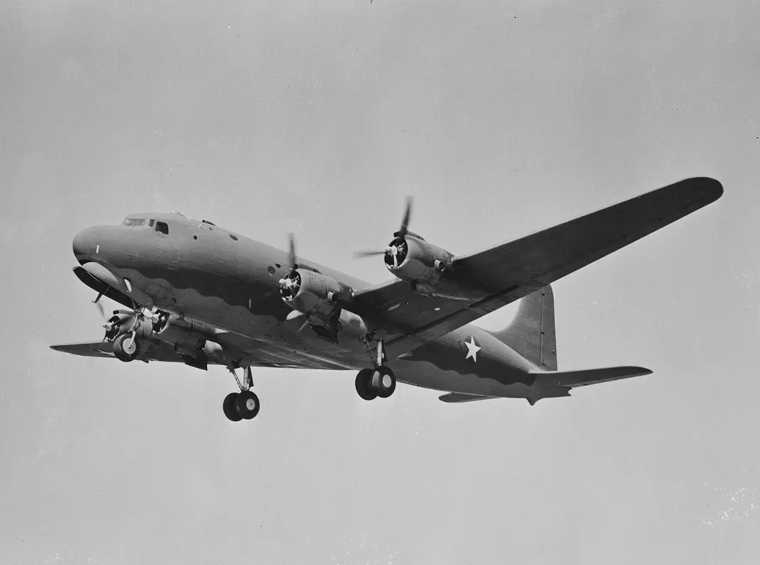 A Douglas C-54 Skymaster transport plane landing in late 1942 or early 1943