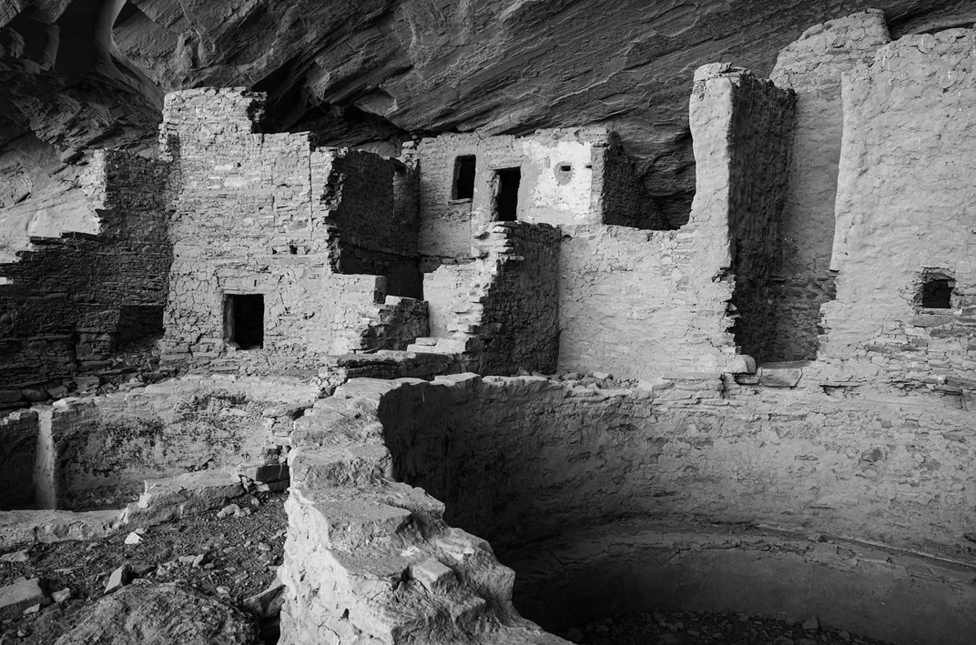 Ancestral Puebloan structures inside Tse Yaa Kin, dating from the 12th and 13th centuries A.D., include a prominent kiva—the round gathering space on the right.
