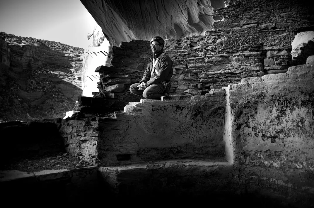 Ramsey, an archaeologist with the NPS for 15 years, sits by the kiva, facing east. Besides his research duties, “It’s also my obligation to protect the rights of Navajo people,” he says.