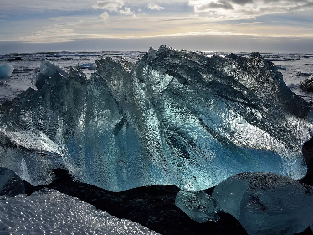 Ice calving off a glacier