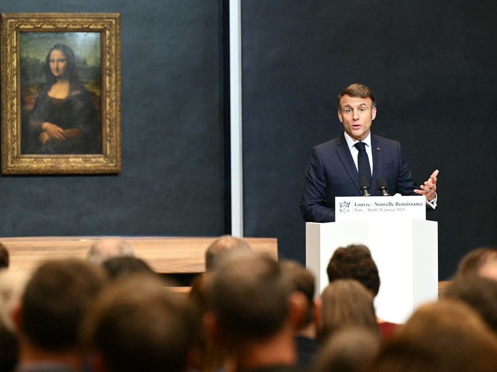 French President Emmanuel Macron with the Mona Lisa