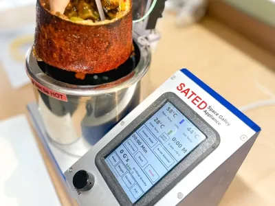 SATED can cook a perfectly crisp pizza in a low- to no-gravity environment.