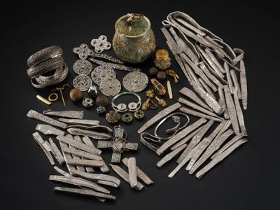 A metal detectorist discovered the Galloway Hoard in a ploughed field in Scotland in 2014.